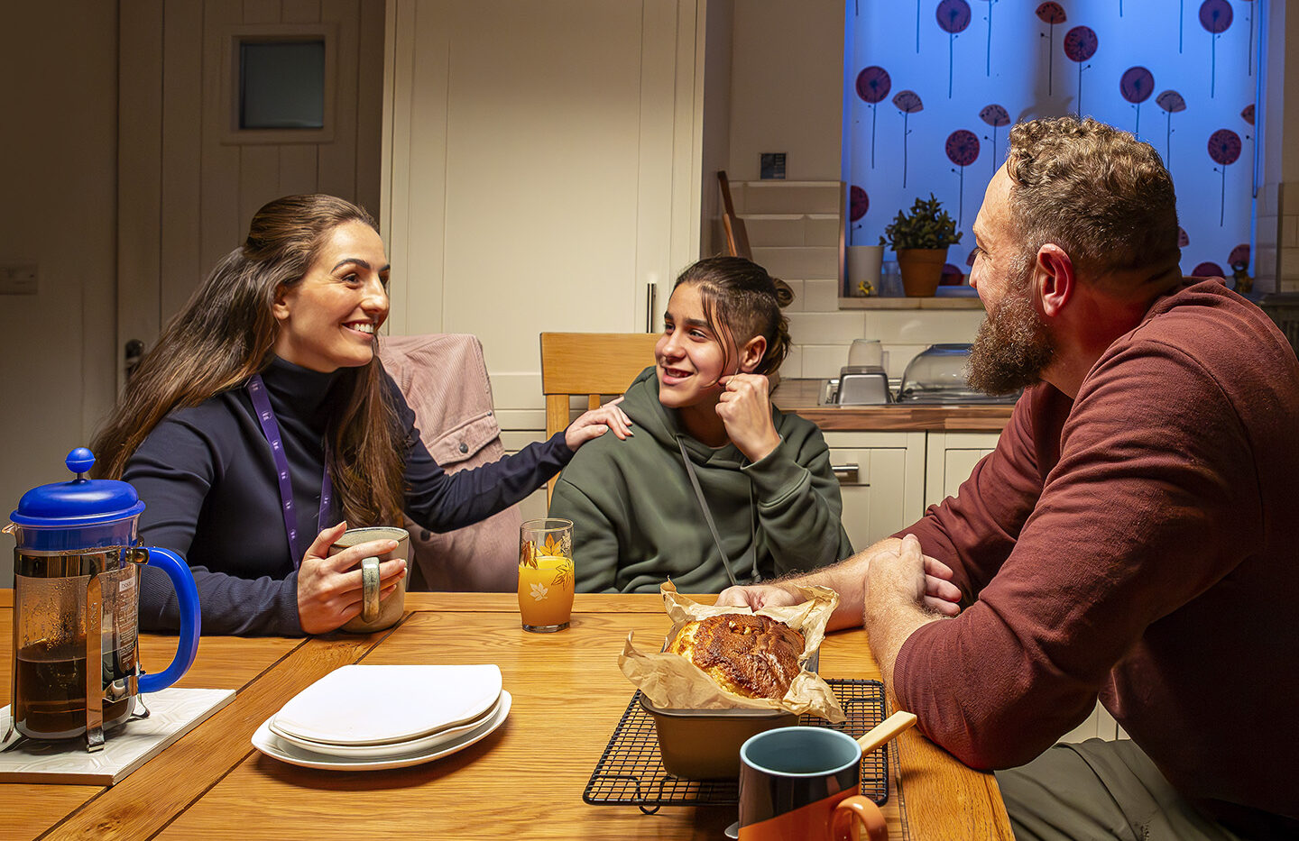 Social worker, young person and foster carer