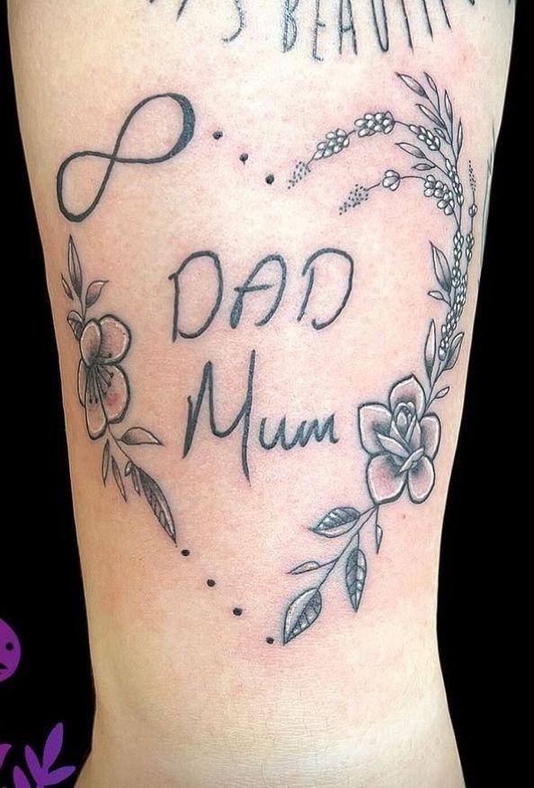 A tattoo of words Dad and Mum